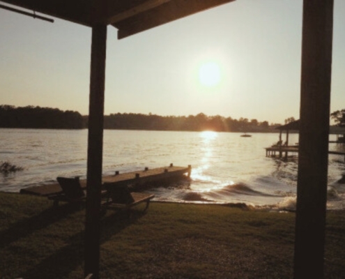 Lakefront view from the front porch of The Love Shack cabin rental overlooking Lake Hamilton