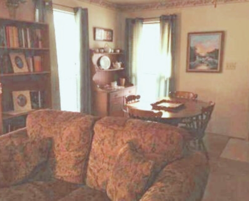 Open living and dining room space in Cabin 10.