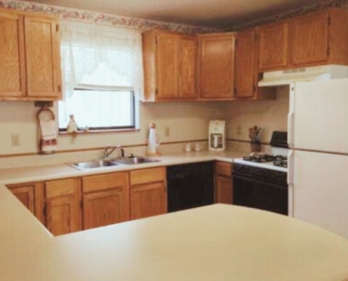 Kitchen showing the cooking area with appliances and counter space.